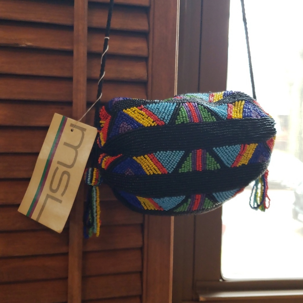 MSL beaded purse. NWT.